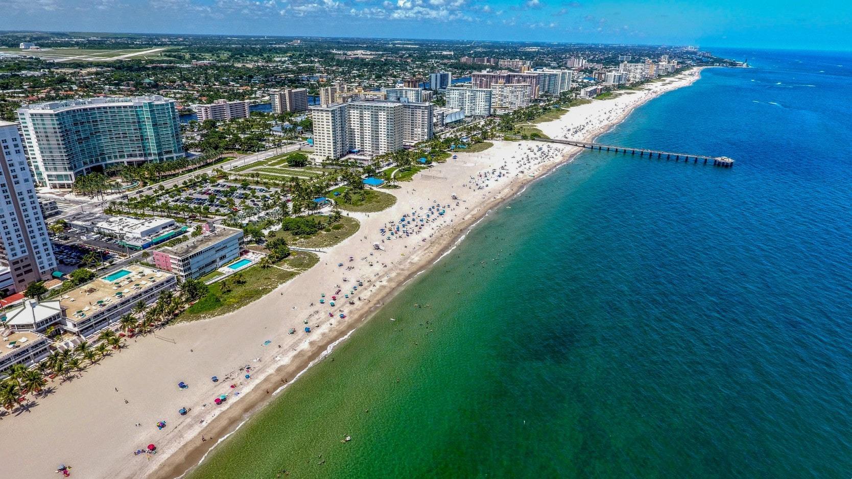 Aerial view of beach and waterfront real estate in Pompano Beach, Florida